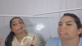 Distorted face in duo against the glass