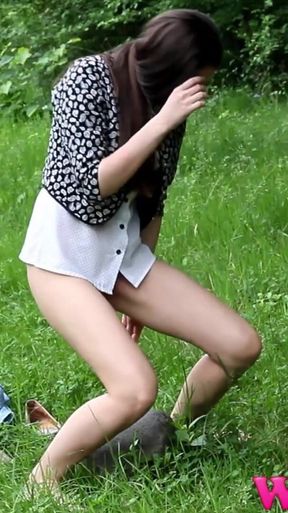 Skinny Brunette Strips in the Forest and Pee on a Rock