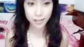 Sexy Asian girl strips off for her chat partner