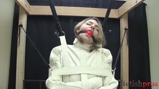 straight jacket fixed to a sybian