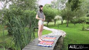 ”Slender teen Niky Love is masturbating in the gardeb”