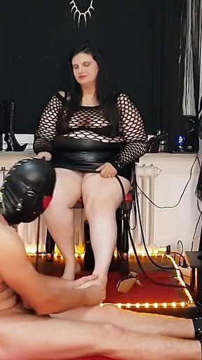 Dominant Brunette Mistress Torments Her Submissive Slave