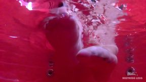 Sexy Nylon Feet In Wet Flesh-Colored Pantyhose In Big Red Bathtub