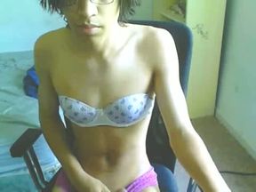 Skinny tranny wearing female lingerie jerks off on webcam