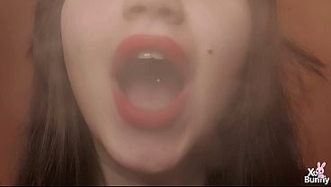 Big lips with red lipstick smoking