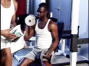 Fit black stud gets his cock sucked at the gym