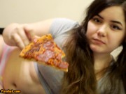 Bored Girl Chews On Pizza