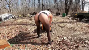 Hot mature wife struts in thong bodysuit and pantyhose during outdoor chores