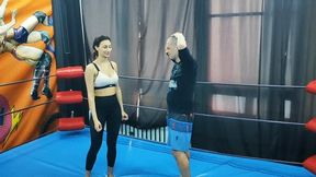 Karateka girl wrestles a guy
