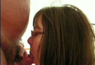 Holding my nerdy girlfriend's head as she slowly blows my junk