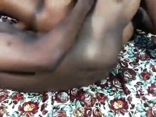Oiled bazookas of a ebony black teenage street hawker