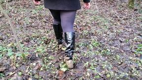 Black knee boots, field and river