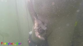 Underwater Fun: Gay Guy Jerks off His Foreskin Penis in a Lake in the Mountains and Pumps Nice Strings of Sperm Into the Water.