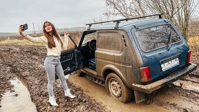 CAR STUCK Tanya enjoys being stuck in the mud at the Niva