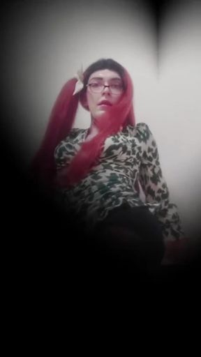 Woman in Green Dress Charms the Camera