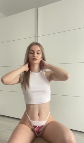 Female Onlyfans Model in White Tank Top