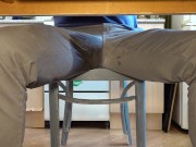 Pissing in jeans under the table