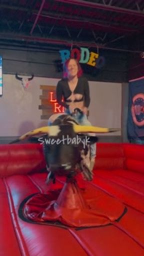 Slutty college girl flashes the whole bar while riding mechanical bull