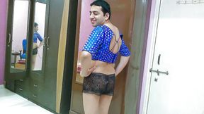 Sweet sissy crossdresser femboy Sweet Lollipop in a top and shorts.