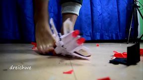 Destroying big car with toy airplane