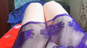 Lovely sissy lying sideways with playful hair twirl
