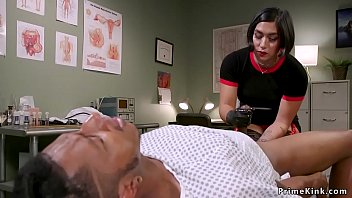 Asian doctor dominates submissive black patient with her firm touch