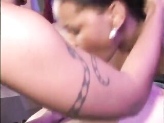 Black girl rubs her partners love button as she rides mans weenie on there couch