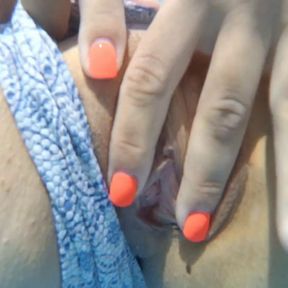 She masturbates in pool in public. Hairy pussy flows underwater