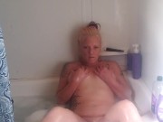 Gemini Baby Plays In A Bubble Bath