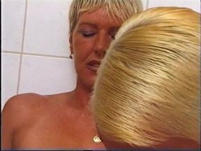 Blonde short haired lesbinas double dildoing and pussy licking in the bathroom