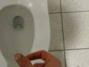 Dude jerks off quietly in stall next to you.