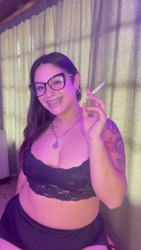 Amateur with natural big tits smokes while showing off her braces on OnlyFans