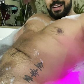 Jerking off in the bubble bath