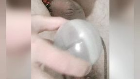 so hot twink enjoys a big anal ball and cums from a strap-on. his anal spits natural lube