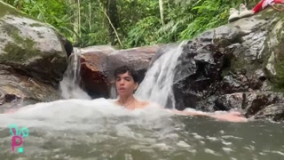 LATINO MASTURBATES IN A WATERFALL AND FILLS WITH MILK
