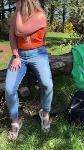 Desperate public wetting jeans in the park