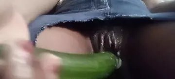 Close-up cucumber insertion