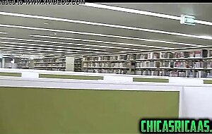 Busty brunette sexy girl in library usa
