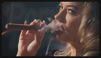 Sultry Milf Satisfies Her Desires with a 9-Inch Cigar