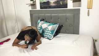 Brunette nympho sucks dildo, gets naked and fucks her pussy with her vibrator in her room