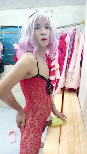 Oanh Le transgender wearing pornographic pantyhose playing with a can of pretense pleasure