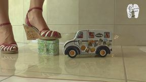 Tin toys under wedge sandals