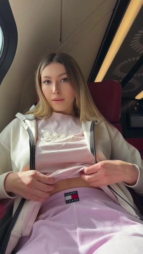 Amateur teen reveals her tits on a crowded train