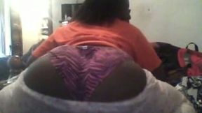 Just a big juicy black ass in pajamas filmed from behind