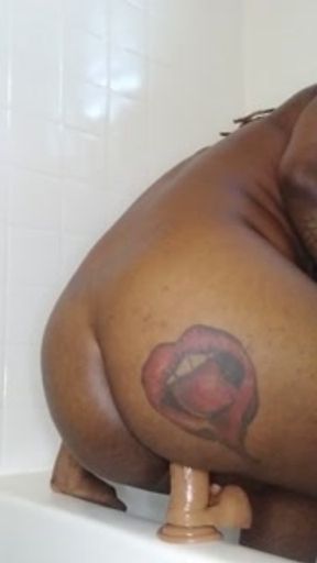 Ebony Rides Dildo In The Bathroom