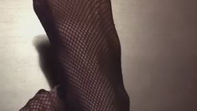 Melove in sexy black stockings with her legs up