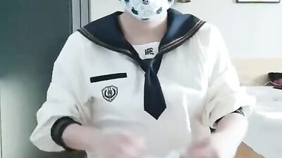 Masked Japanese teen is playing with a prick while no one's home