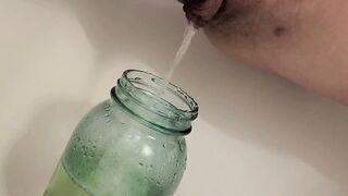 cunt with mouth Pees inside a Mason Jar  Almost Fills it up