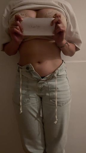 Curvy blonde amateur in blue jeans plays with a naughty card all
