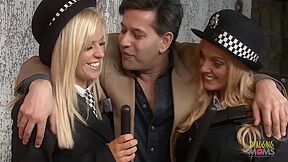 Two Blonde Milf Police Officers Arrest A Guy And Take Him To The Back Alley For A Threesome